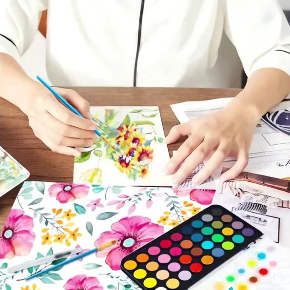 watercolor paint set with brush