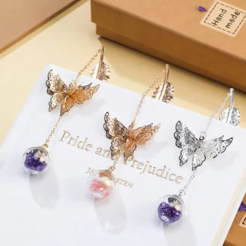 Metal feather bookmark with butterfly charms